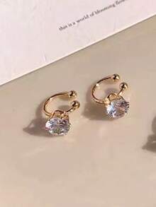 1 par de elegantes y lujosos pendientes de aro con circonita sintética brillante incrustada, clips de oreja ajustables sin perforación adecuados para mujeres, perfectos para uso diario y banquetes de fiesta