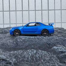 1:32 比例 R34 合金汽车模型，金属压铸跑车玩具，带模拟声光、减震轮胎、可开门、可回力行驶，适合用作桌面装饰，送给男孩的礼物