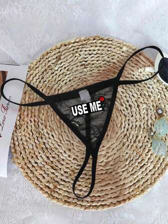 女士黑色性感蕾丝丁字裤，蝴蝶结装饰，印有“USE ME”字母，舒适透气内衣