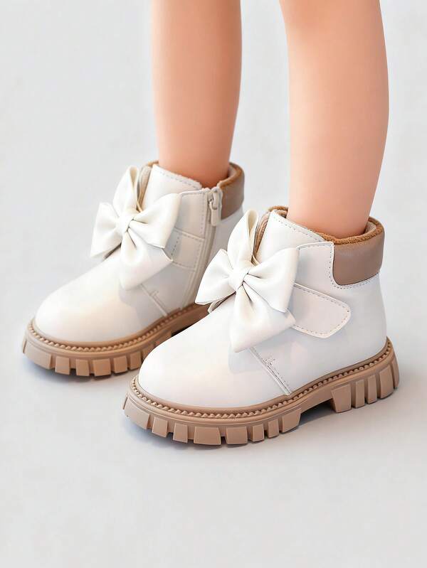 زوج من الأحذية ذات اللون الأحادي مع فيونكة للأطفال الصغار والأولاد في فصل الخريف/الشتاء، ذات قاعدة ناعمة مانعة للانزلاق