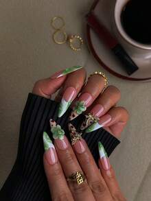 NAIO 10 Pieces Handmade Almond-Shaped Y2K Baddie-Style Press-On Nails In Nude, White, Green, And Brown Leopard Print French Tips, 3D Floral Gel Nail Designs, And Gold Bow Embellishments. They're Perfect For Everyday Looks For Women And Girls, As Well As For Parties, Ceremonies, And Other Occasions. The Included Tool Kit Makes A Great Gift For Women And Girls.