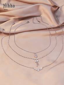 Hihho Set de 3 piezas de collar con diseño de lazo, flor y gota incrustada con circonita, regalo de joyería de lujo personalizada y elegante para mujeres - Plateado - Ver 3