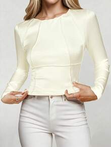 这款春季长袖女式上衣采用独特设计，圆领罗纹针织面料，修身剪裁凸显身材曲线。短款腰身设计增添一丝性感青春气息，是春夏穿着的理想之选。它百搭实用，春夏皆宜叠穿。 - 3杏色 - 查看 5