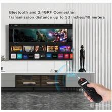 teclado inalámbrico compacto de 5.0 pulgadas con diseño ergonómico y retroiluminación LED ajustable, ideal para controlar dispositivos Smart TV, PC, laptops, y sistemas multimedia; incluye función Air Mouse para navegación precisa y cómoda sin necesidad de ratón adicional, conexión inalámbrica estable vía tecnología avanzada de bajo consumo, batería recargable de larga duración, compatible con múltiples plataformas y sistemas operativos; perfecto para gaming, trabajo remoto y uso cotidiano en el hogar u oficina, portátil y ligero para fácil transporte, con teclas suaves y silenciosas para mayor confort en sesiones prolongadas; accesorios y configuración rápida incluidos para una experiencia inmediata y fluida de uso en ambientes oscuros o poco iluminados. - Negro - Ver 5
