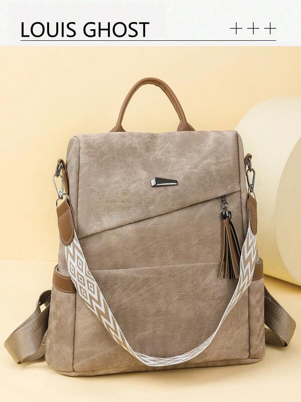 [Mochila | Manifiesto del Viajero Urbano]​​Estética Transfronteriza del Ciclismo y la Vida Cotidiana​​ El Body de color caqui fluye con una textura de pliegues naturales, y las líneas divisorias geométricas delinean un perfil minimalista moderno. Las dobles asas de cuero marrón con la borla colgando a un lado ondean con el viento, y la correa para el hombro tejida en blanco está impresa con patrones geométricos marrones.