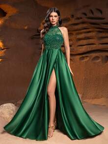 Faeriesty 这款优雅的女士露背晚礼服采用高开衩 A 字裙摆设计，饰以闪亮点缀，散发出奢华正式的气息——非常适合盛大晚宴、红毯活动、高端婚礼、著名颁奖典礼和黑领结晚宴。 - 墨綠色 - 查看 8