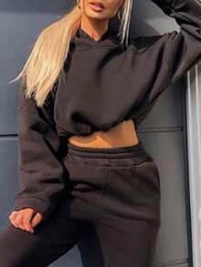 Sudadera corta de manga larga con capucha y forro polar, en color liso Sudadera corta ajustada con capucha, forro polar y cordón, ideal para la temporada otoño/invierno y para las mujeres que siguen las últimas de moda.Sudaderas de Mujer - Negro - Ver 2
