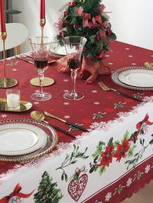 Une nappe de Noël joyeuse - motifs de fleurs rouges et d'arbres de Noël, en polyester, décorations rectangulaires pour le repas de fête