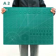 1pc Extra Large Self-Healing Cutting Mat - A1/A2/A3 Size, With Grid Lines And Diagonal Cut Guides, Suitable For Fabric, Paper, Cardboard - Heavy Duty Craft, DIY, Office, School, Technical Drawing - Compatible With Cutting Machines (Fits A0-A3 Paper Sizes) - Green Grid Layout And White Borders For Precise Alignment - Durable Smooth Surface, Long-Lasting, Large Craft Cutting Mat, Hobby Cutting Mat
