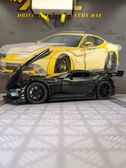 YCMODEL A Simulation Alloy Car Model Of A High-Performance High-Tech Supercar. The Body Of The Car Model Is Made Of Zinc Alloy Material, And On Both Sides Can Be Opened. The Front Hood Can Also Be Opened. The Car Model Has Simulated Sound And Lighting Functions. It Is Finely Crafted, Of Good Quality, And Has A Realistic Shape. It Is Suitable For Collection And As A Birthday Gift For Friends