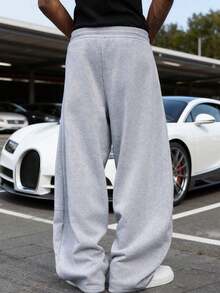 男士休闲裤，宽松阔腿户外运动裤，采用基础款弹力腰带和口袋设计。适合健身、户外徒步和返校穿着。 - 淺灰色 - 查看 3