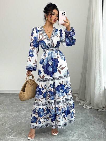 Vestido longo feminino com estampa floral, corte A justo na cintura e mangas bufantes. Este vestido é elegante e romântico, perfeito para encontros, férias, feriados e outras ocasiões.
