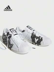 Adidas Adidas (ADIDAS) Adidas Originals Superstar 80s Chinesisches Sternzeichen Hund, rutschfeste und verschleißfeste Sneaker mit niedrigem Schaft, Unisex Weiß und Schwarz SUPERSTAR 80S CHINESE ZODIAC DOG