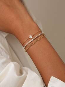 Nooxian Bộ 3 vòng tay nữ, phong cách bãi biển mùa hè Bohemian, bao gồm chuỗi cơ bản nhiều lớp mạ vàng, chuỗi đá Zirconia tennis, chuỗi kẹp giấy, mặt dây chuyền cỏ bốn lá bằng đá Zirconia khảm đồng, vòng tay xếp chồng nhiều lớp, quà tặng trang sức - Vàng - Xem 4