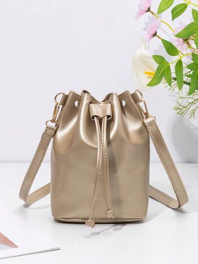 Bolsa balde dourada elegante com fecho de cordão, alça de ombro ajustável, bolsa feminina minimalista e estilosa