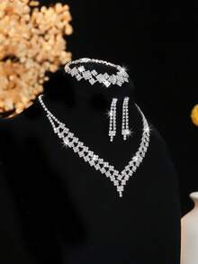 Conjunto de joyería de 4 piezas con collar, aretes y pulsera con cristales de lujo y diseño geométrico, accesorios elegantes y versátiles adecuados para uso diario, bodas, fiestas y como regalo para mujeres