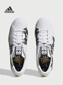 Adidas Adidas (ADIDAS) Adidas Originals Superstar 80s Chinesisches Sternzeichen Hund, rutschfeste und verschleißfeste Sneaker mit niedrigem Schaft, Unisex Weiß und Schwarz SUPERSTAR 80S CHINESE ZODIAC DOG