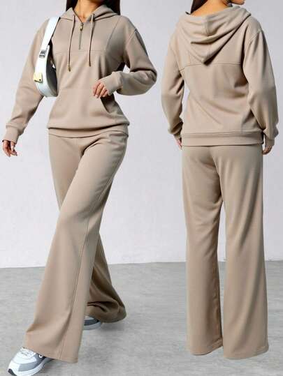 Elegante suéter de mujer con traje de pantalones largos