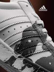 Adidas Adidas (ADIDAS) Adidas Originals Superstar 80s Chinesisches Sternzeichen Hund, rutschfeste und verschleißfeste Sneaker mit niedrigem Schaft, Unisex Weiß und Schwarz SUPERSTAR 80S CHINESE ZODIAC DOG