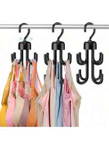 旋转式背心衣架，最多可收纳 48 件衣物，塑料材质，适用于胸罩、吊带背心、腰带、领带等，是公寓、宿舍、衣橱收纳的理想之选。