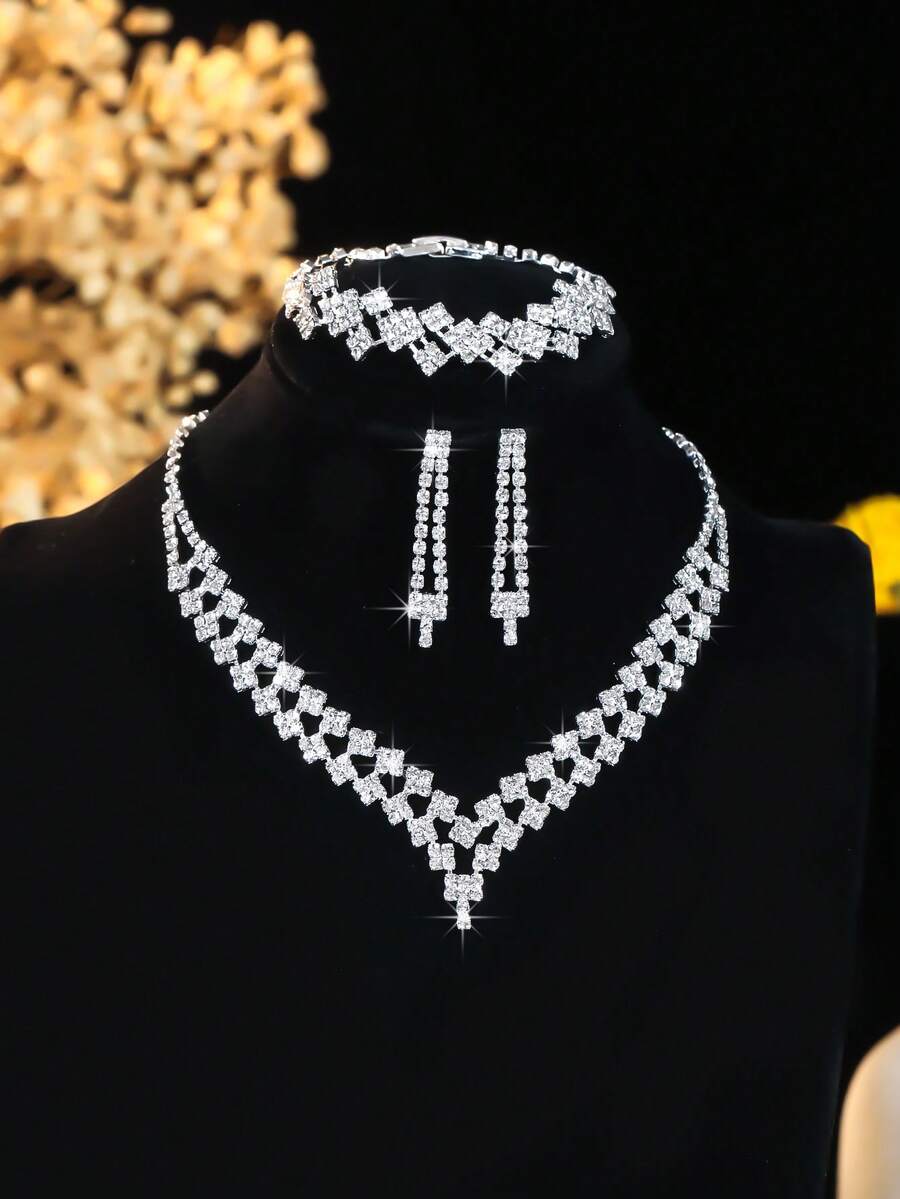Conjunto de joyería de 4 piezas con collar, aretes y pulsera con cristales de lujo y diseño geométrico, accesorios elegantes y versátiles adecuados para uso diario, bodas, fiestas y como regalo para mujeres
