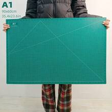 1pc Extra Large Self-Healing Cutting Mat - A1/A2/A3 Size, With Grid Lines And Diagonal Cut Guides, Suitable For Fabric, Paper, Cardboard - Heavy Duty Craft, DIY, Office, School, Technical Drawing - Compatible With Cutting Machines (Fits A0-A3 Paper Sizes) - Green Grid Layout And White Borders For Precise Alignment - Durable Smooth Surface, Long-Lasting, Large Craft Cutting Mat, Hobby Cutting Mat