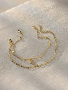 Tkool Set de 2 pulseras de mujer con diseño clásico de capas y elemento de cruz (cantidad de cadena y cuentas al azar) - Amarillo Oro - Ver 2