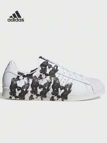 Adidas Adidas (ADIDAS) Adidas Originals Superstar 80s Chinesisches Sternzeichen Hund, rutschfeste und verschleißfeste Sneaker mit niedrigem Schaft, Unisex Weiß und Schwarz SUPERSTAR 80S CHINESE ZODIAC DOG