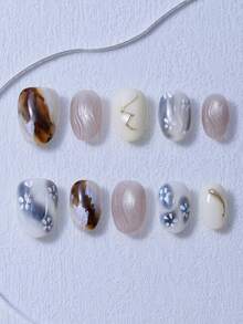 Juego de 10 piezas de uñas postizas cortas y redondas, con degradado de color, líneas doradas pintadas a mano, efecto ligero y lujoso, uñas cortas japonesas hechas a mano, estilo chica caliente, estilo Y2K, elegante y grandioso, adecuado para que las mujeres y las niñas lo usen.