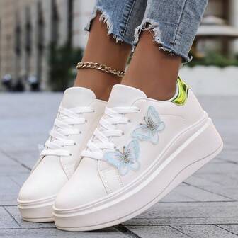 Trendiga fjärilsdesignade plattformsneakers med tjock sula