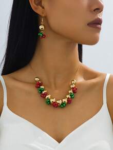 Set de 3 piezas de joyas de moda punk navideñas con un diseño minimalista de campanas, incluyendo collar, pulsera y aretes, un conjunto de joyas único para fiestas navideñas