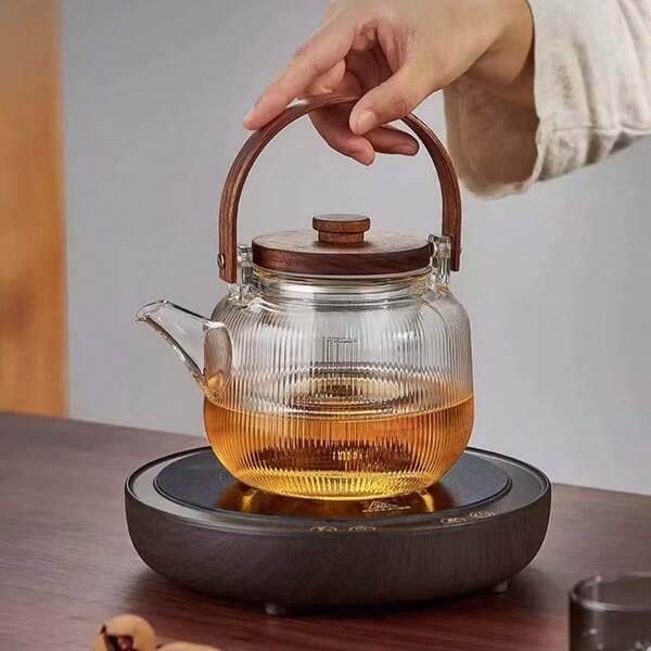 1pc, 1000ml, Transparent, Striped Handle Teapot, Wooden Handle Glass Teapot With Infuser And Lid, Heat Resistant, Can Be Used On Electric Stove, Striped Texture, Excellent Glass Teapot For Black Tea And Green Tea, Convenient To Use, Suitable As A Gift For Colleagues And Elders