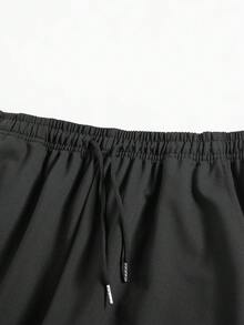 男士纯色简约百搭针织裤，十字印花，时尚有型，适合运动和休闲场合，款式多样，穿着舒适。女士们可以买来送给男友或丈夫，这将是一份很棒的礼物。 - 黑色 - 查看 6