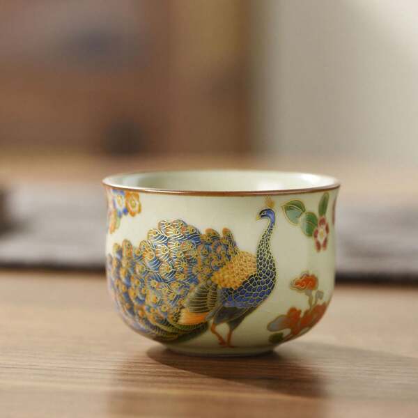 1 pieza Taza de té de porcelana elegante con diseño de pavo real, nueva taza de té de estilo chino de alta gama y exquisita para la ceremonia del té, adecuada para reuniones con amigos y familiares, tomar el té de ocio y como regalo