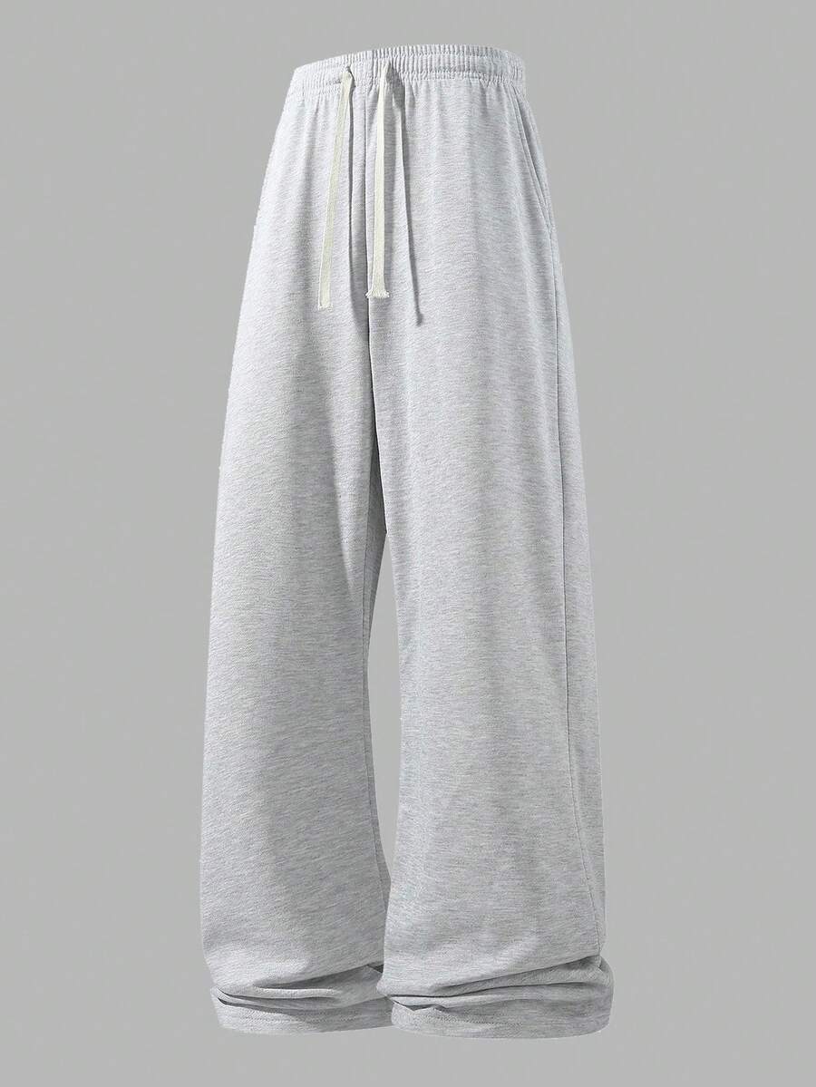 Men's Loose Casual Sports Pants, Minimalist Solid Color Wide Leg Design, With Drawstring Waist And Large Pockets, Lightweight And Comfortable, Suitable For Daily Walking, Work, Travel And Other Occasions.