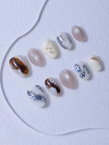 Juego de 10 piezas de uñas postizas cortas y redondas, con degradado de color, líneas doradas pintadas a mano, efecto ligero y lujoso, uñas cortas japonesas hechas a mano, estilo chica caliente, estilo Y2K, elegante y grandioso, adecuado para que las mujeres y las niñas lo usen.