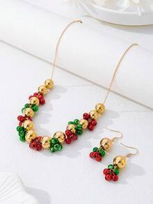 Set de 3 piezas de joyas de moda punk navideñas con un diseño minimalista de campanas, incluyendo collar, pulsera y aretes, un conjunto de joyas único para fiestas navideñas