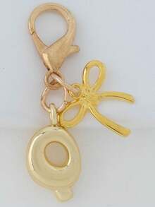 1个A-Z金色泡泡字母可爱吊坠，蝴蝶结装饰，钥匙扣，戒指托，背包挂饰，汽车挂饰，购物，海滩，露营，钱包配饰。适合作为送给女性、朋友和学生的礼物，时尚创意设计，生日礼物装饰，圣诞礼物。 - 金色蝴蝶結 - 查看 14