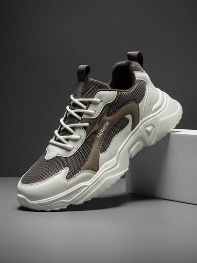 男士拼色低帮跑步休闲鞋，时尚拼布设计，适合日常通勤和休闲穿着