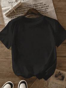 Camiseta casual para mujer estilo espiritual con estampado religioso de vela y flores, tela ligera, impresión colorida, ajuste holgado, cuello redondo, manga corta, primavera y verano, uso diario, camiseta - Negro - Ver 2