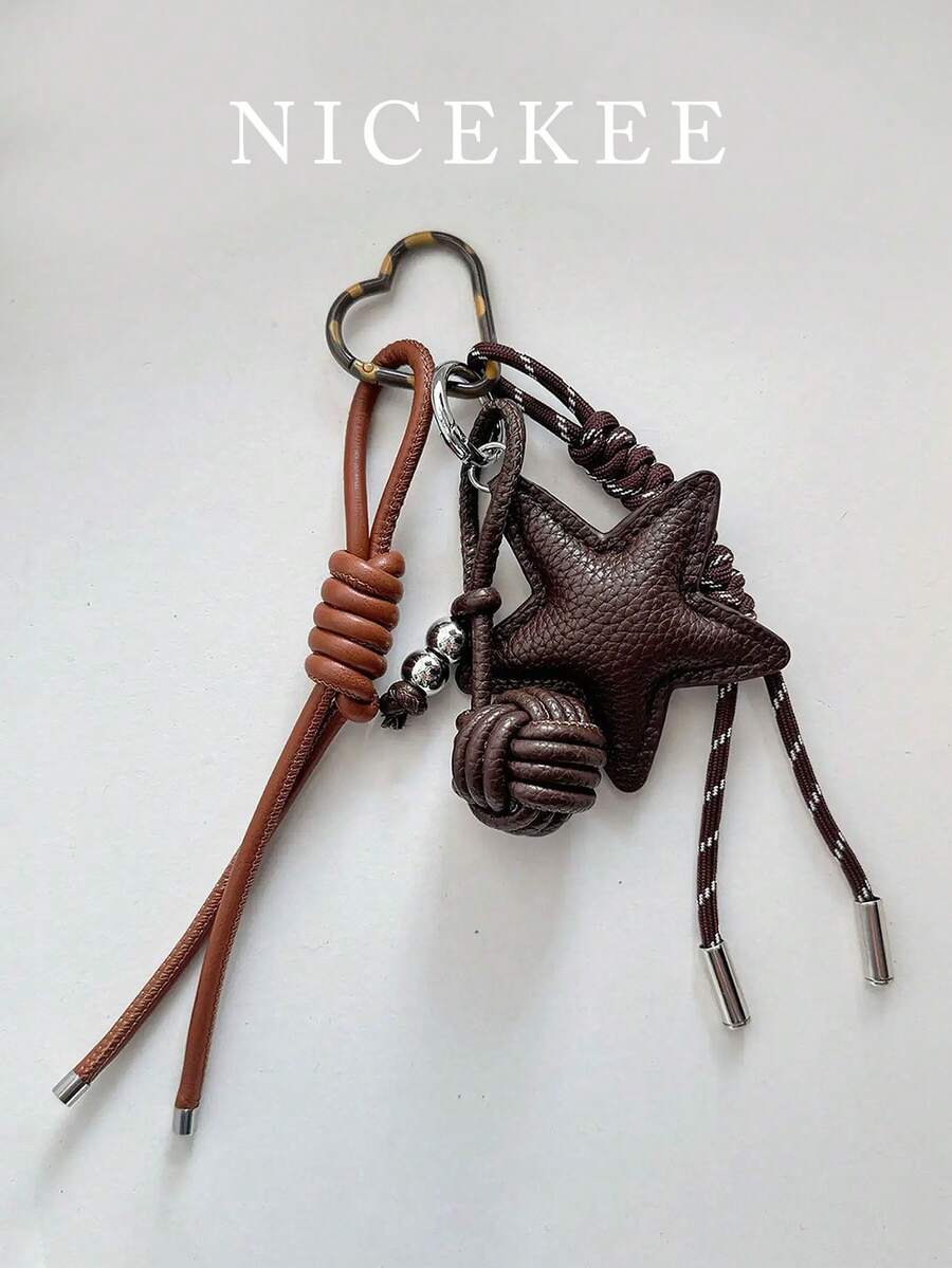 简约时尚，可爱心形包包挂饰，饰以银珠和蝴蝶结，性价比高，小巧别致的心形钥匙扣，甜美清新的风格，适合日常搭配，也可作为包包挂饰或钥匙扣礼物。 - 咖啡 - 查看 1