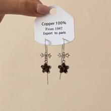 1 par de aretes con diseño de estampado de leopardo, estrella y decoración con borlas, diseño único y lujoso, ganchos elegantes