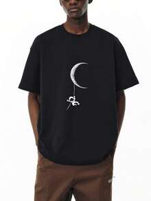 disfraz halloween hombre,camisas de hombre,ropa de hombre,playera de hombre,Camiseta de Manga Corta 100% Algodón - Cuello Redondo Negro, con Estampado Creativo de Patrón de Astronauta en la Luna con Estilo Divertido en el Frente, Estilo Fashion, Aireada, Cómoda y Suave para la Piel - Negro - Ver 1