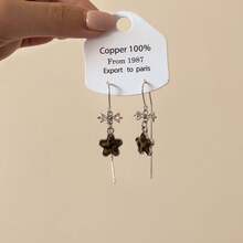 1 par de aretes con diseño de estampado de leopardo, estrella y decoración con borlas, diseño único y lujoso, ganchos elegantes