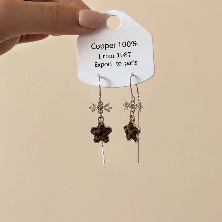 1 par de aretes con diseño de estampado de leopardo, estrella y decoración con borlas, diseño único y lujoso, ganchos elegantes