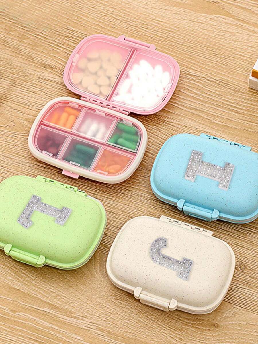 1 pieza Caja de píldoras portátil con diseño de letra, 8 compartimentos, organizador de píldoras compacto y mini - Estuche para píldoras, pastillero semanal, dispensador de medicamentos, caja de medicina portátil y a prueba de agua de varias capas para viajes - Multicolor - Ver 1