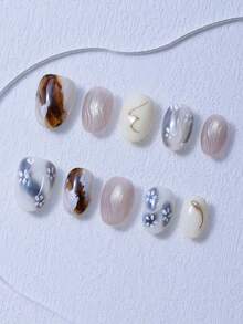 Juego de 10 piezas de uñas postizas cortas y redondas, con degradado de color, líneas doradas pintadas a mano, efecto ligero y lujoso, uñas cortas japonesas hechas a mano, estilo chica caliente, estilo Y2K, elegante y grandioso, adecuado para que las mujeres y las niñas lo usen.