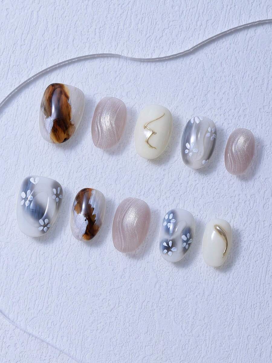 Juego de 10 piezas de uñas postizas cortas y redondas, con degradado de color, líneas doradas pintadas a mano, efecto ligero y lujoso, uñas cortas japonesas hechas a mano, estilo chica caliente, estilo Y2K, elegante y grandioso, adecuado para que las mujeres y las niñas lo usen.