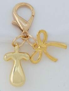 1个A-Z金色泡泡字母可爱吊坠，蝴蝶结装饰，钥匙扣，戒指托，背包挂饰，汽车挂饰，购物，海滩，露营，钱包配饰。适合作为送给女性、朋友和学生的礼物，时尚创意设计，生日礼物装饰，圣诞礼物。 - 金色蝴蝶結 - 查看 23