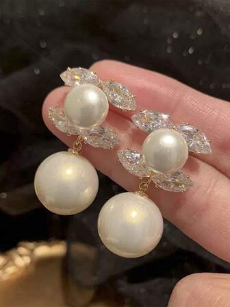 Boucles d'oreilles pendantes avec perle, élégantes et raffinées